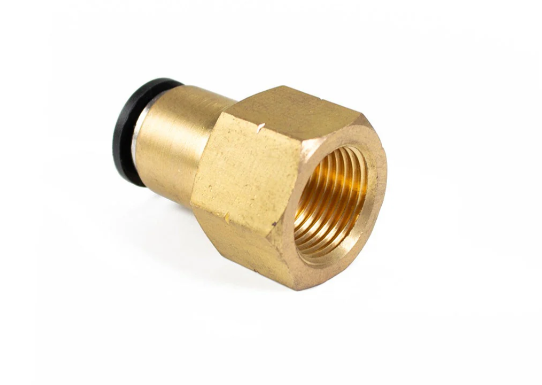 Brass fitting with black gasket on a white background