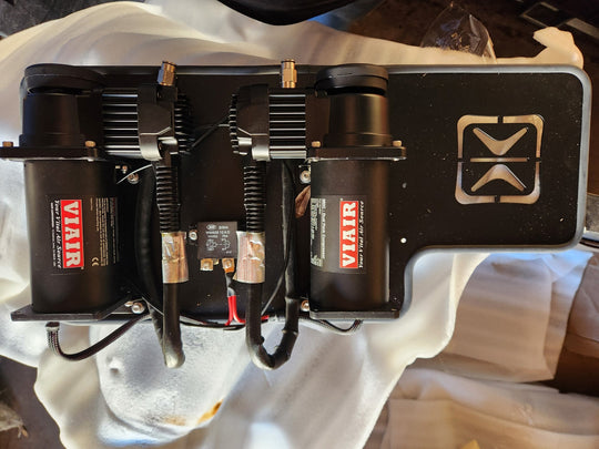 VIAIR winch on a white surface